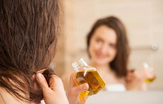 Which oil is best for frizzy hair?